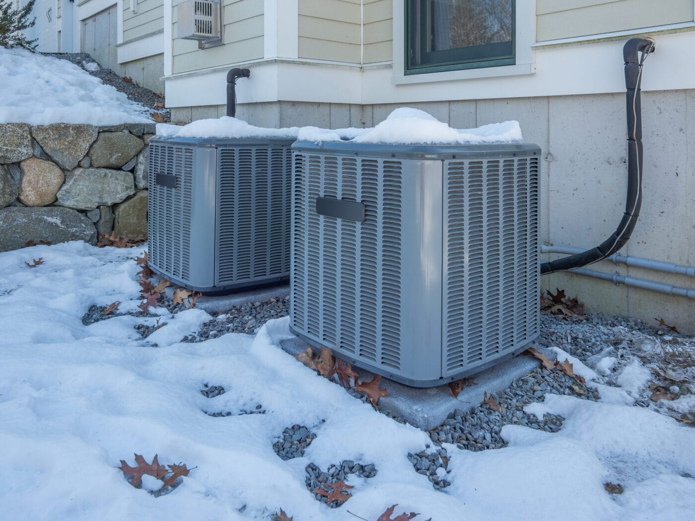 New HVAC units with a small amount of snow